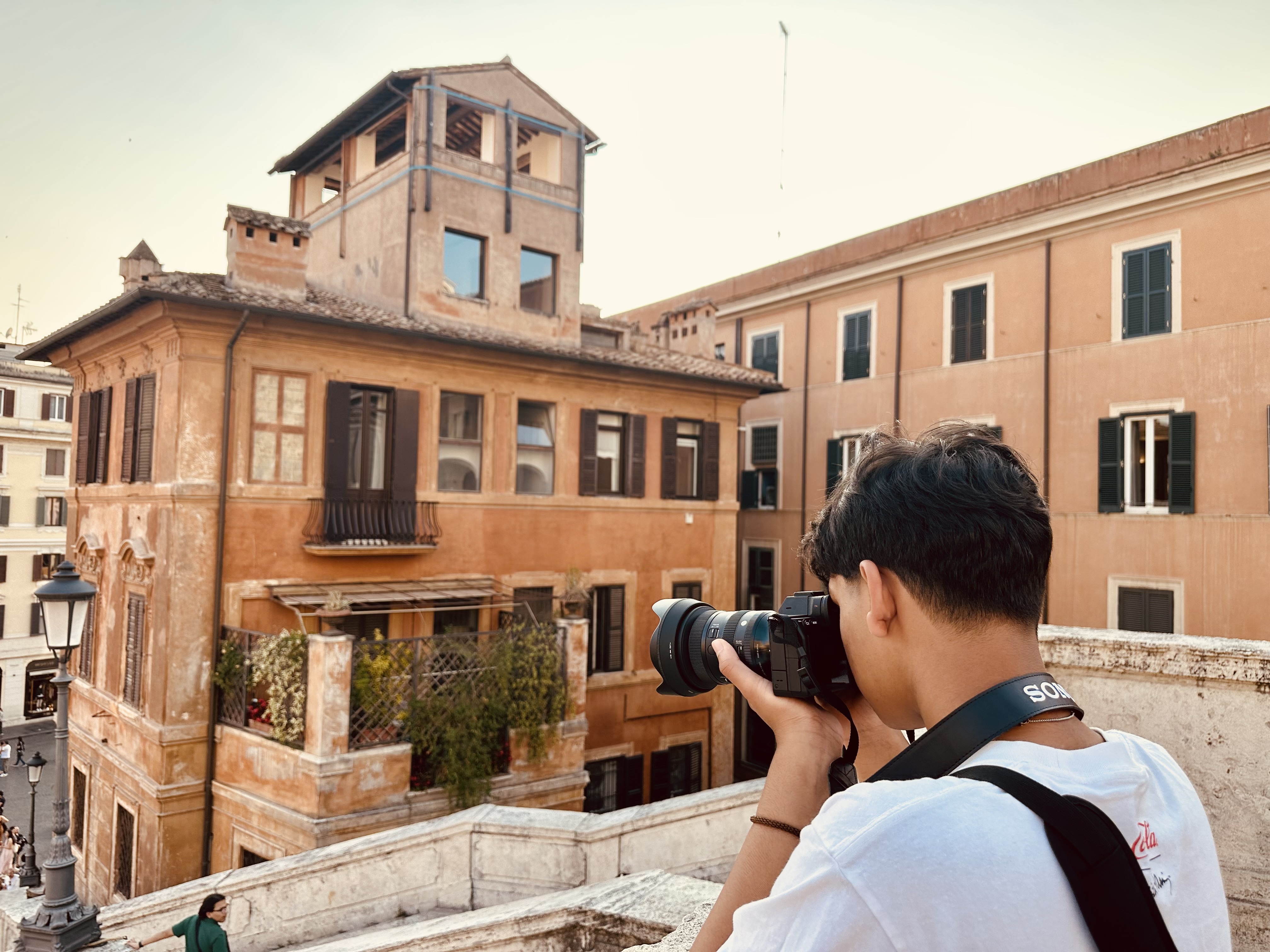 Taking a photo on a city rooftop